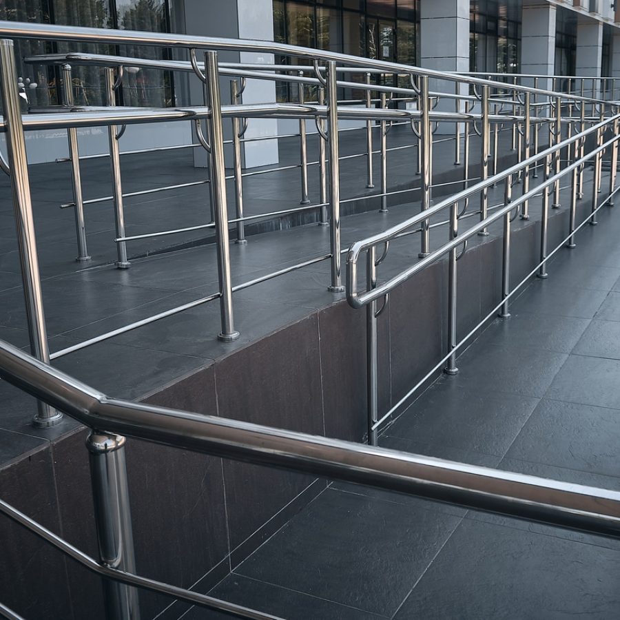 Ramp for people with disabilities and chrome railings.